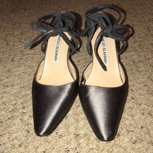 Satin and Suede Manolo Blahnik heels.